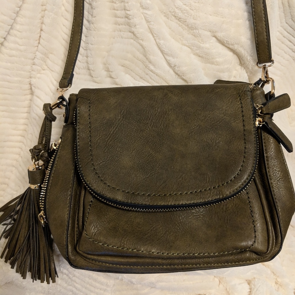 Olive green Sasha + Sofi shoulder bag with tassels